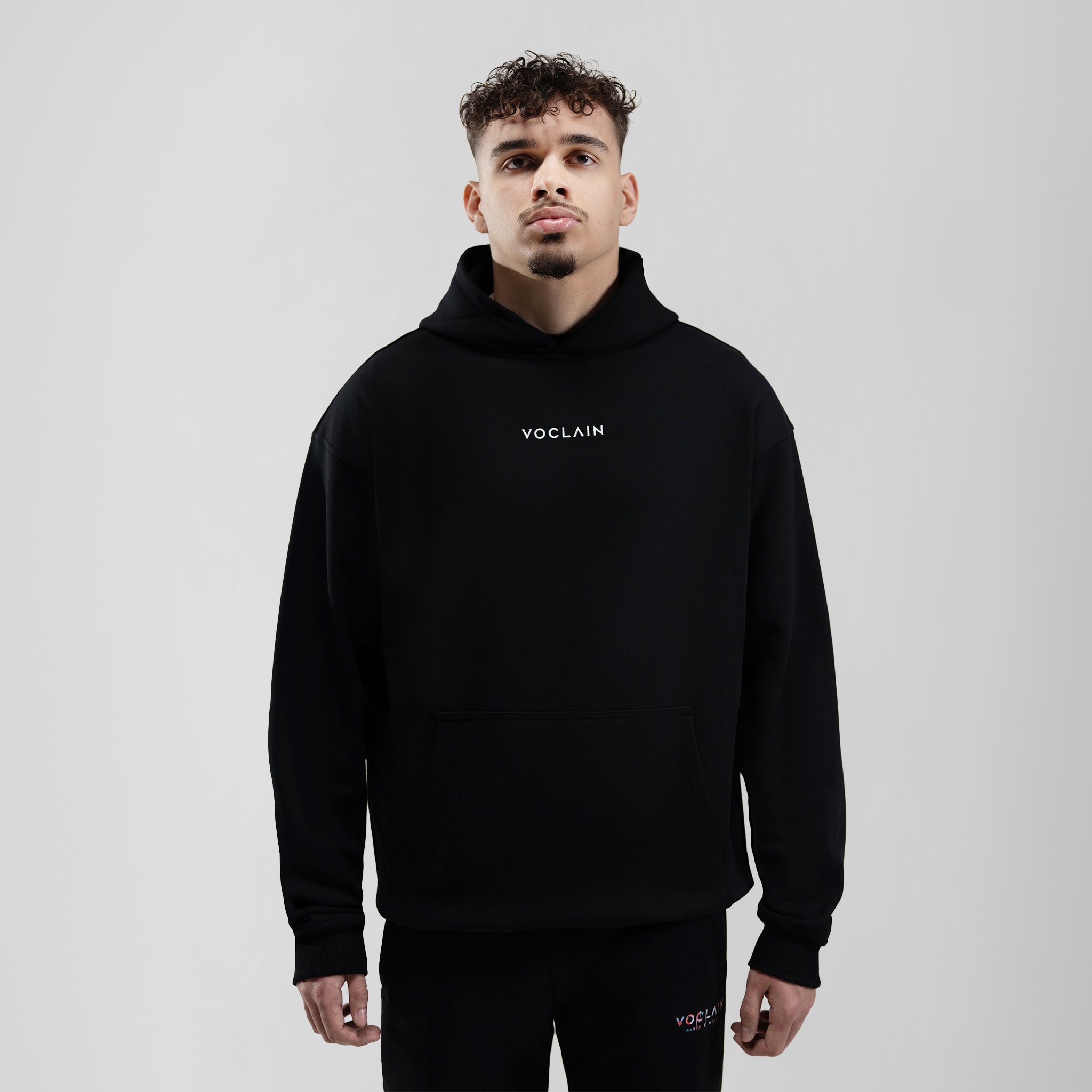 Model with Voclain Black Hoodie